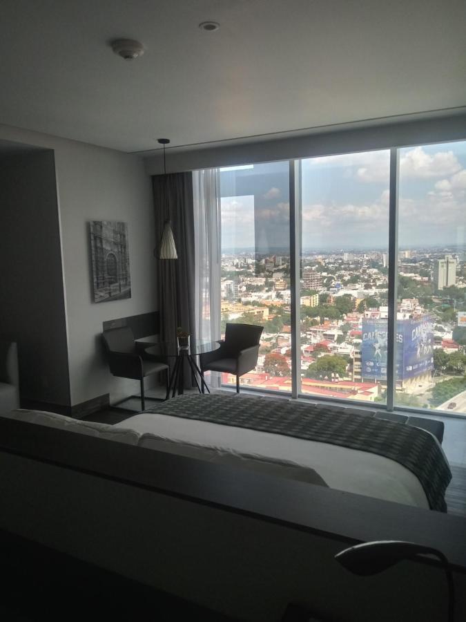 Baruk Guadalajara Hotel de Autor Bagian luar foto A room at the hotel