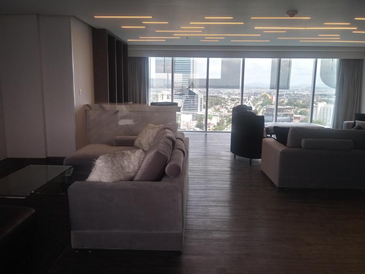 Baruk Guadalajara Hotel de Autor Bagian luar foto A living room in a penthouse apartment at the Ritz-Carlton, DIFC